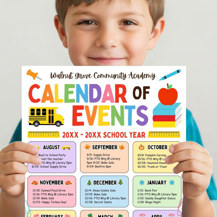 Child holding a colorful school calendar of events for school events.